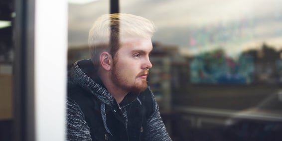 Man pensively thinking about the unexpected change in his life